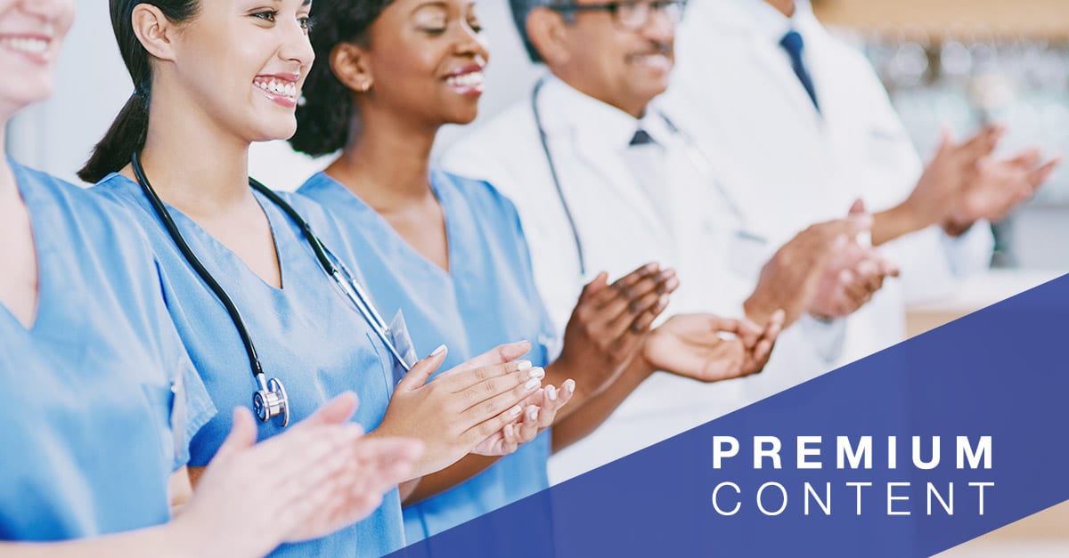 Closeup shot of a group of medical practitioners applauding in a hospital