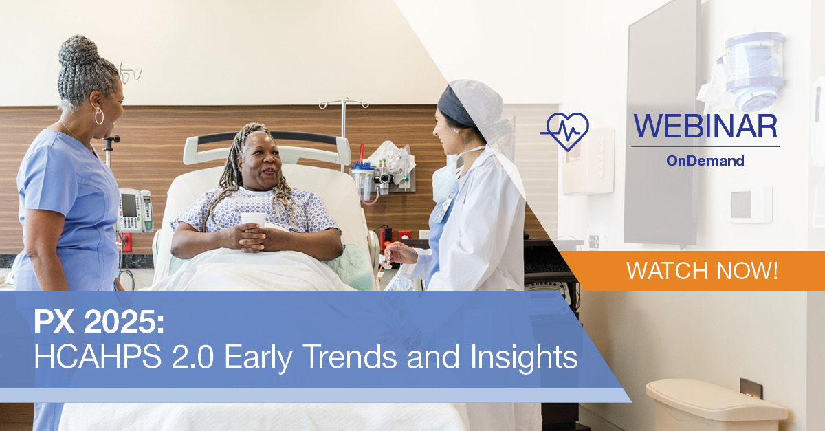 Doctor and nurse treating patient in hospital bed